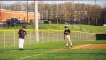 Doug Holt at 3rd base gets instruction from Coach Bour