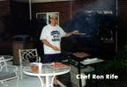 Chef Ron Rife cooking up some Cobra burgers at a post game cook out.