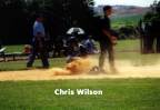 Chris Wilson slides into home plate.