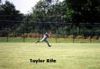 Taylor Rife diving for a fly ball to right field.