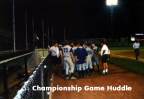 Cobras gathered around Manager Wayne Bobby for some guidance before going out on the defensive.