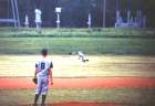 Brian Bobby diving to catch the fly ball to left field.