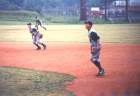 Taylor Rife, Chris Wilson, & Louis Ullrich going for a high fly ball.