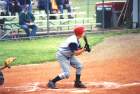 Taylor Rife with a successful bunt that advanced the players on base.