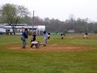 Tj hits a high fly ball to center